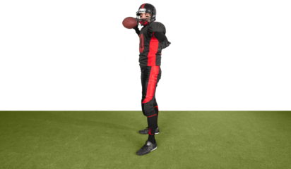 American football player with the ball on stadium background