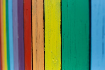 A painted fence colorful wooden background