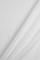 Obraz premium white cotton fabric draped, bed linen