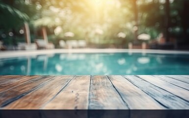 Fototapeta premium Abstract pool ambiance. Blurred pool background with wooden table for product showcase