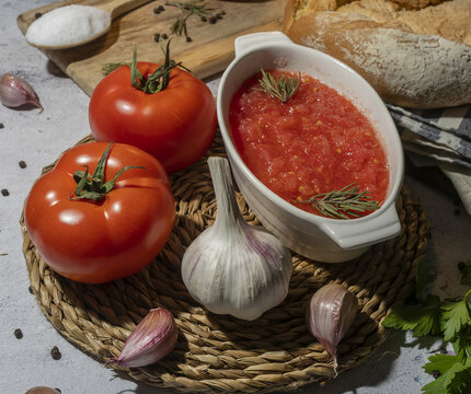 Fresh ingredients for tomato sauce preparation on table