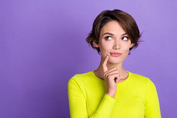 Photo of charming young woman stylish yellow shirt touch chin hmm wondered her vacation look...
