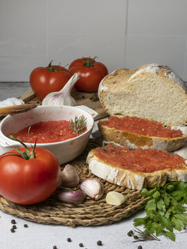 Appetizing bread with tomato spread in kitchen