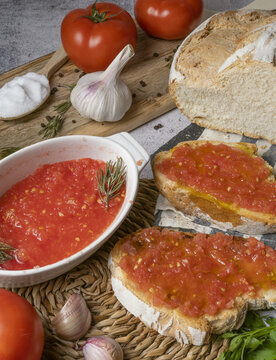 Appetizing bread with tomato spread in kitchen