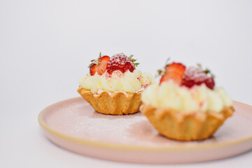 background of colorful cakes with fruit- close up of cakes