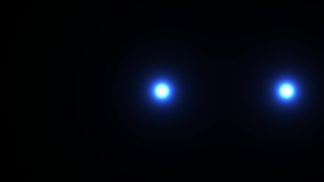 Two Blue Orbs Light One Static In The Middle The Other Move Horizontally
