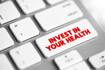 Invest In Your Health text button on keyboard, concept background