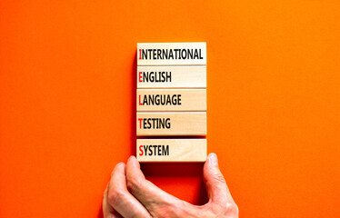 IELTS symbol. Concept words IELTS international english language testing system on wooden block....