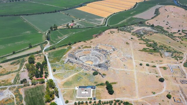 Miletus theater built for 5300 people in the Hellenistic period, was increased to 15000 by increasing its capacity with Roman period. Aerial birdseye view Didim Aydin in Turkey Country
