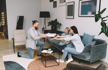 Content man sharing pizza with woman