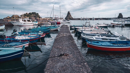 Boats at the enchanting port of Aci Trezza, Sicily - 615533228