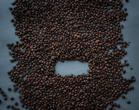 Coffee beans isolated on grey colour background with copy space for text, Flat lay image of high quality coffee bean