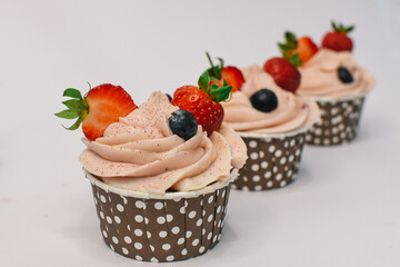background of colorful cakes with fruit- close up of cakes