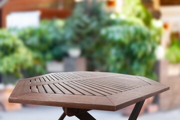 Small table on green outdoor background