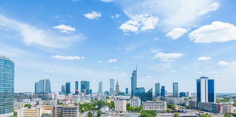 Aerial panorama of Warsaw, Poland over the Vistual river and City center in a distance. Downtown...