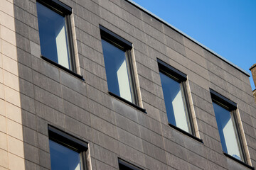 Modern freshly constructed urban building, combined steel with glass and concrete, downtown of Belgrade city, Serbia
