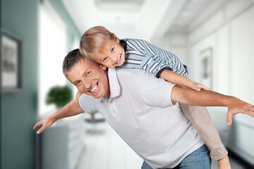 Fototapeta premium Happy young family with cute child