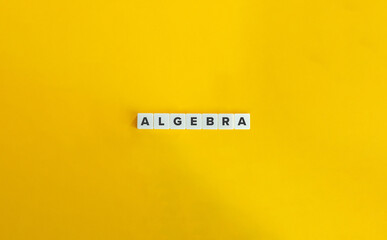 Algebra Word on Block Letter Tiles on Yellow Background. Minimal Aesthetic.