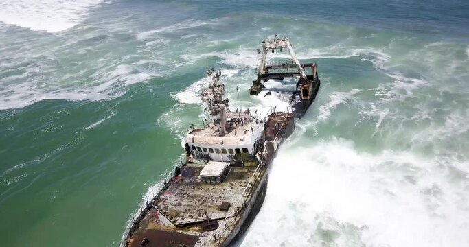 4K Aerial drone footage of an Abandoned Shipwreck Zeila on Famous Skeleton Coast, Namibia. Namibian Atlantic coastline, Zeila L-758 Walvis Bay stranded rusty ship at sand beach in Skeleton Coast Park