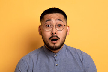 Omg. Closeup Portrait Of Shocked Young Asian Man Looking At Camera