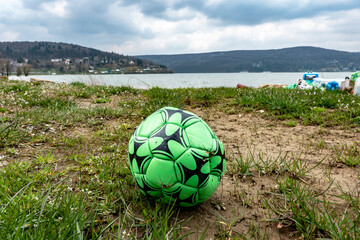 Old damaged deflated soccer ball