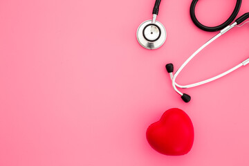 Fototapeta premium Red heart and medical stethoscope, medical and health care concept
