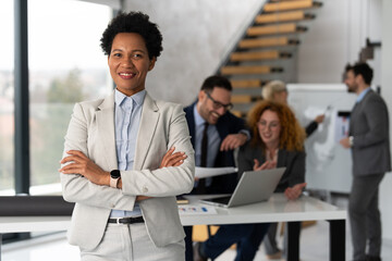 Portrait of confident businesswoman at startup company