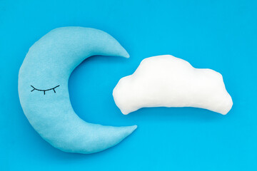 Cute moon pillow with cloud. Bedding for good sleep and rest