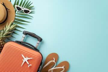 Tropical retreat vibes. Top view of orange suitcase, tiny airplane replica, beach must-haves,...