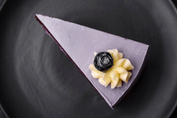 Delicious fresh blueberry or blackcurrant cake with cream cheese
