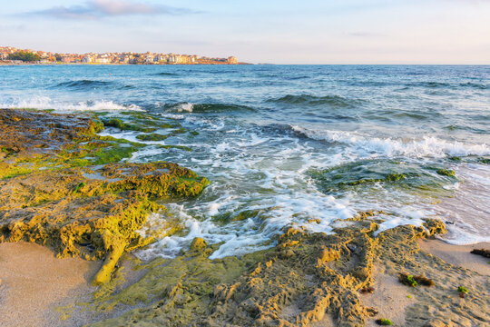 wave washing the shore at sunrise. relax at the black sea coast