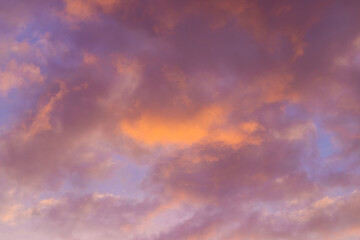 Beautiful sky background. Orange and purple sunset. Texture for you design