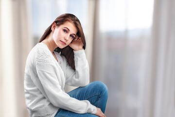 Sad upset beautiful young woman thinking