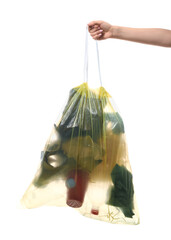 Female hand holding full garbage bag isolated on white background