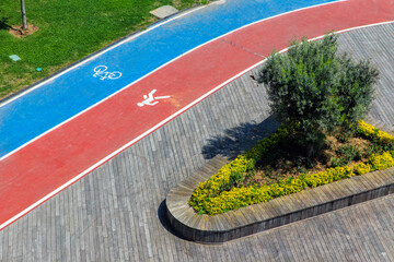 Pedestrian runway and bicycle lane side by side