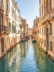 Fototapeta na wymiar Canal with historic buildings in Venice, Italy, Europe.