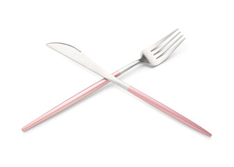 Stainless steel fork and knife with pink handles on white background
