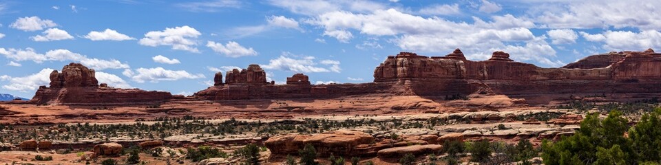 Panorama of wooden Shoe Arch in the Needles district of Canyonlands National Park near Moab Utah.
