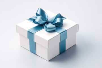 Obraz premium White gift box with blue ribbon on white background Generative AI