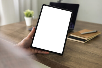 man hand holding digital tablet touch white screen device isolated screen ONLINE ADVERTISING communication empty space frame mockup, internet touchpad touchscreen information ipad. © onephoto