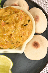 cod moqueca, fish cream with olive oil and flatbread.