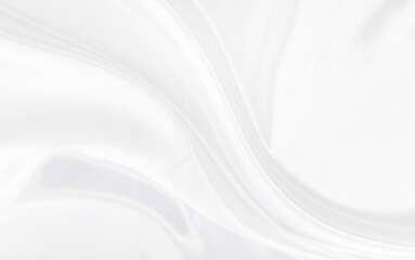 White gray satin texture that is white silver fabric silk background with beautiful soft blur pattern natural.