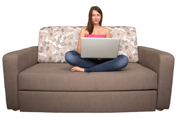 Portrait of a Young Woman Using her Laptop While Sitting on a Couch