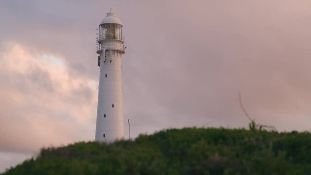 Close up uf Slangkop lighthouse in Kommetjie near Cape Town south Africa at sunset, white building