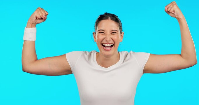 Woman, face and fitness with flex, strong arms or muscle for smile, excited or pride by blue background. Girl bodybuilder, happy and body development with comic laughing for success, exercise or goal