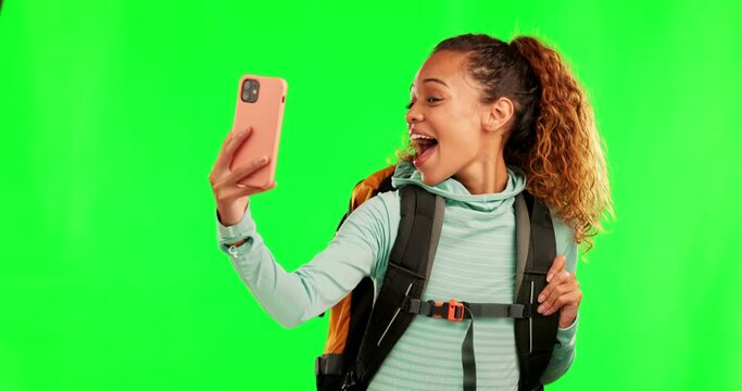 Green screen smile, hiking selfie or happy woman trekking, backpacking and travel for photography. Social network app, chroma key peace sign or fitness person post memory picture on studio background