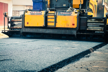 Machinery used to make asphalt roads.