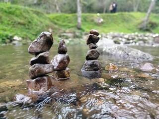 rock art balancing on a river
