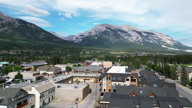 Town of Canmore, Areal view. residential, mountains,  Banff National Park, Alberta, Canada. 4K
