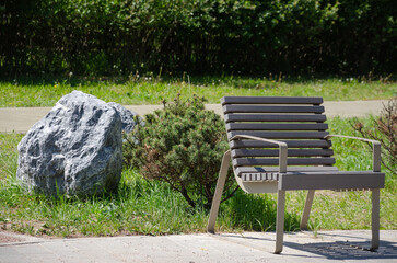 A free wooden bench in the park - Powered by Adobe